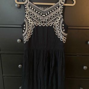 Black flare dress with white Aztec detail